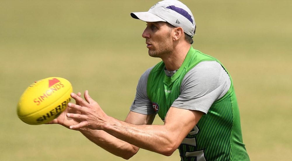 GOLD COAST, AUSTRALIA - OCTOBER 20: Harry Taylor of the Cats  marks during a Geelong Cats AFL media opportunity at Southport Sharks on October 20, 2020 in Gold Coast, Australia. (Photo by Quinn Rooney/Getty Images via AFL Photos)